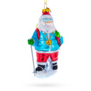 Snowshoeing Santa Blown Glass Christmas Ornament