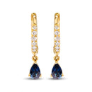 10K Yellow Gold Pear Blue Sapphire and 1/10 Cttw Diamond Drop and Dangle Huggy Hoop Earrings (H-I Color, I1-I2 Clarity)