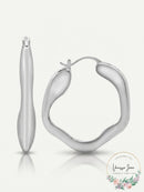 And Now This Silver Plated Wave Look Click Top Earrings