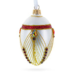 Red Jewels Eccentrics on White Glass Egg Ornament 4 Inches