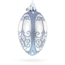 Silver Scrolls on White Glass Egg Ornament 4 Inches